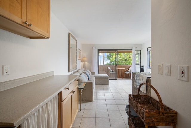 7 Kaiau Pl Unit 6, Kihei, HI 96753 - kitchen with open floor plan and light tile patterned floors