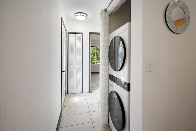7 Kaiau Pl Unit 6, Kihei, HI 96753 - laundry room with stacked washer / dryer and light tile patterned flooring