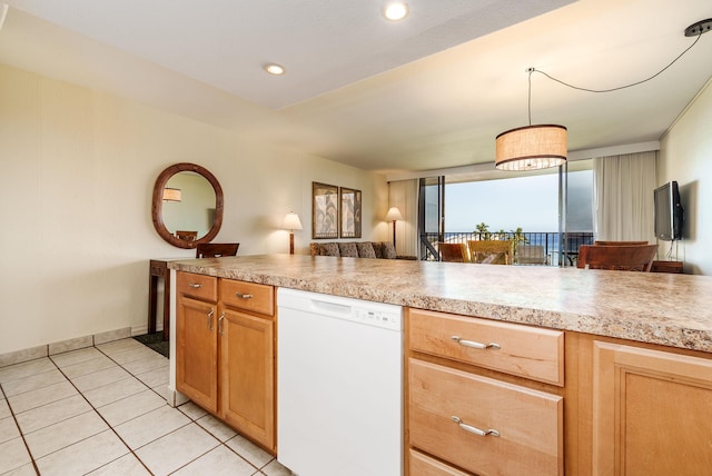 kitchen with light tile patterned floors and dishwasher