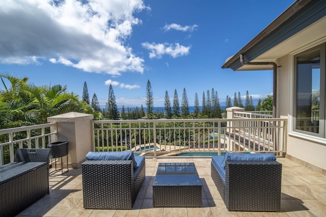 view of patio featuring an outdoor pool and an outdoor hangout area