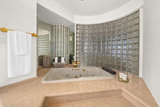 bathroom featuring a whirlpool tub