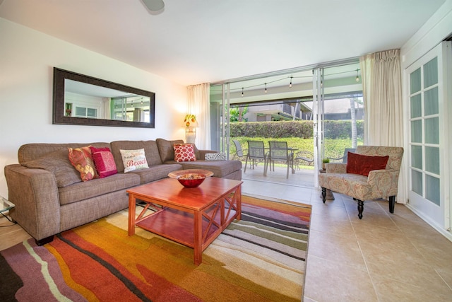 living room with tile patterned floors