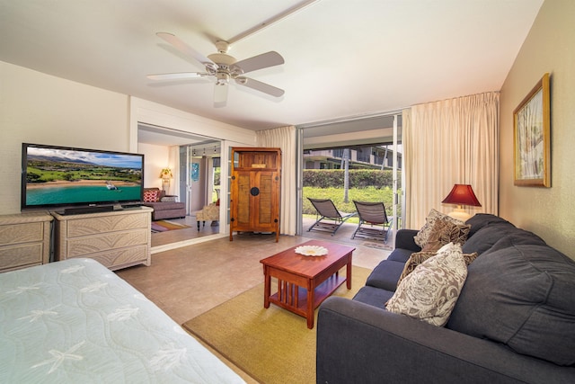 living room featuring tile patterned flooring and ceiling fan