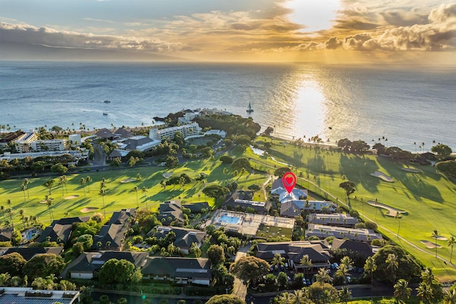 aerial view at dusk with a water view