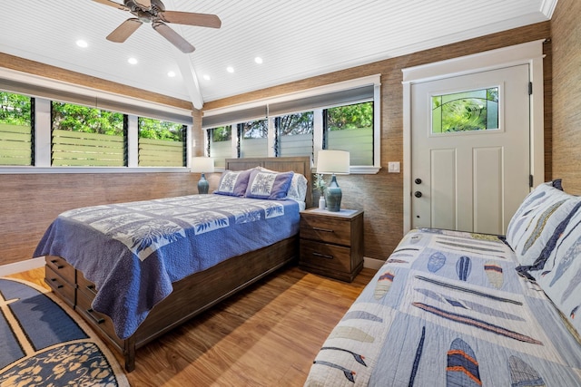 bedroom featuring light wood-type flooring, multiple windows, ceiling fan, and recessed lighting