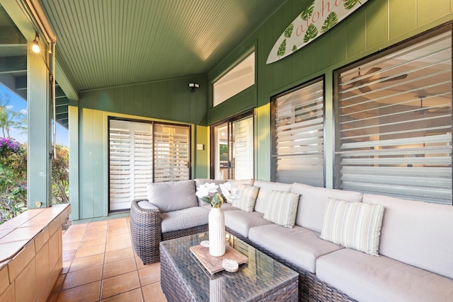 sunroom with lofted ceiling