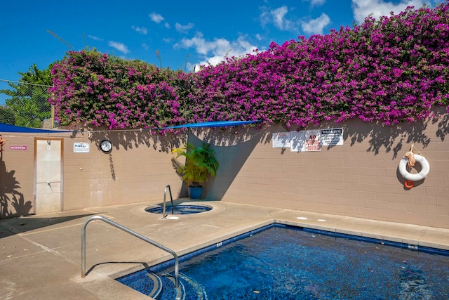 view of swimming pool featuring a patio