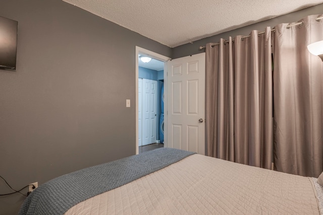 bedroom with a textured ceiling