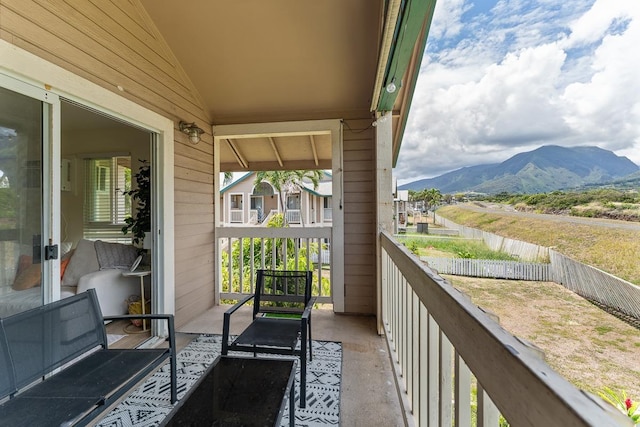 balcony featuring a mountain view