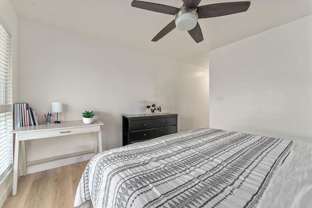 bedroom with ceiling fan and wood finished floors