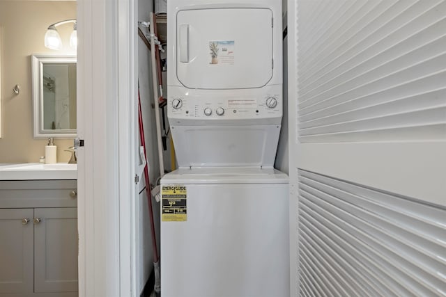 laundry area with stacked washer / dryer