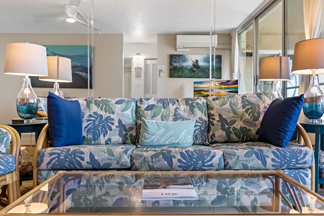 living room featuring ceiling fan and an AC wall unit