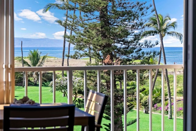 balcony with a water and mountain view