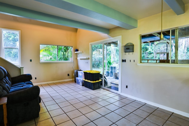 tiled living room featuring beam ceiling