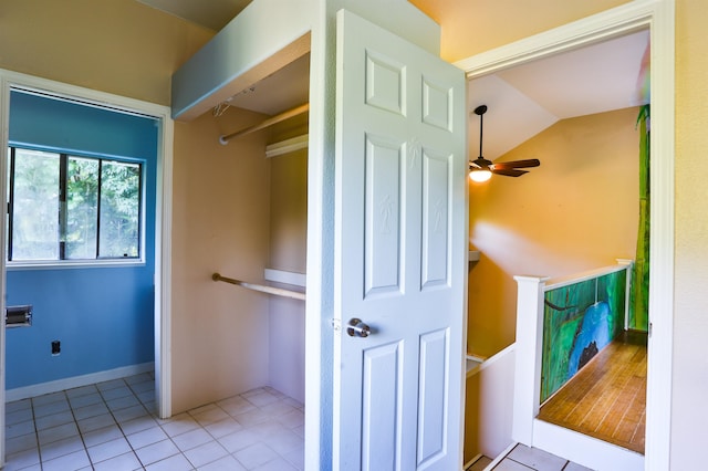 bathroom featuring lofted ceiling, tile patterned floors, and ceiling fan