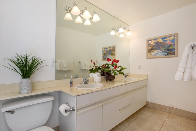 bathroom featuring vanity, a chandelier, tile patterned floors, and toilet