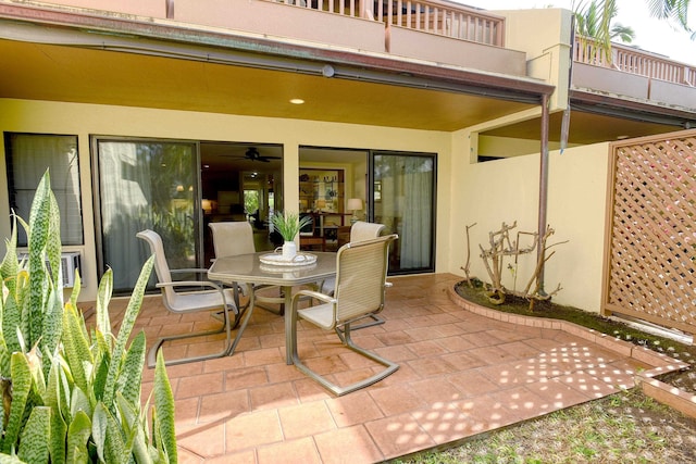 view of patio with a balcony