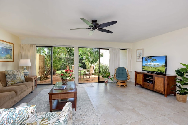 tiled living room with ceiling fan