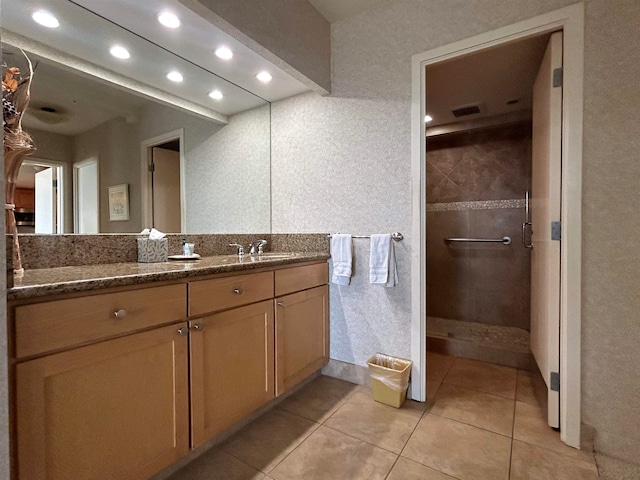 bathroom featuring tile floors and oversized vanity