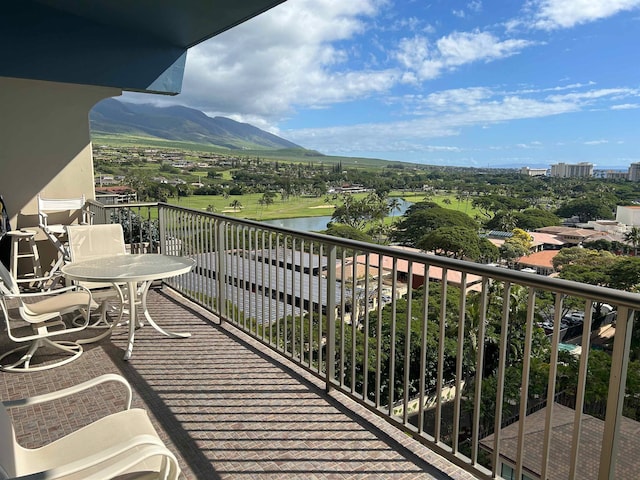 balcony featuring a mountain view