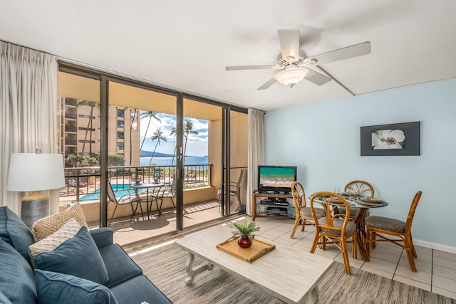 living room with light tile flooring and ceiling fan