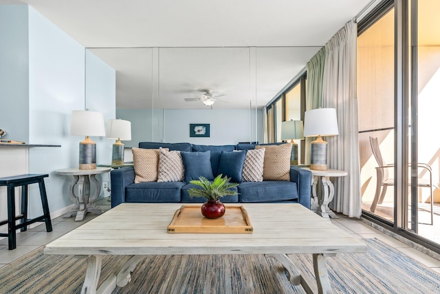 tiled living room featuring ceiling fan