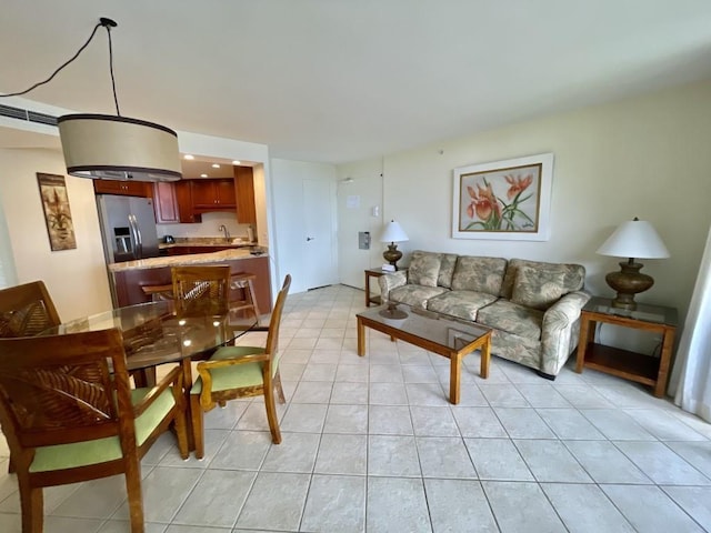 living room featuring light tile patterned flooring