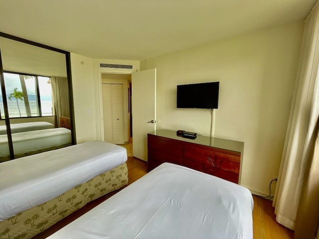 bedroom featuring hardwood / wood-style floors