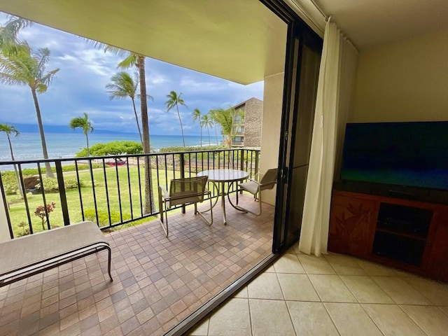 balcony featuring a water view