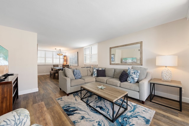 living room featuring dark wood-type flooring