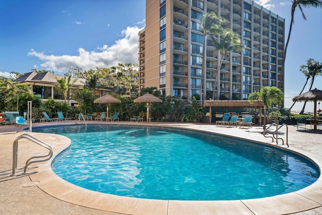 pool with a patio