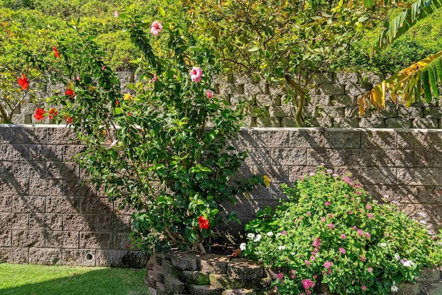 exterior details featuring fence