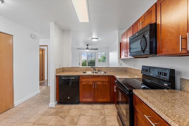 kitchen with sink, black appliances, ceiling fan, and light stone countertops