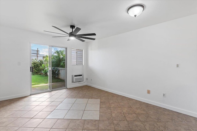 tiled spare room with an AC wall unit and ceiling fan