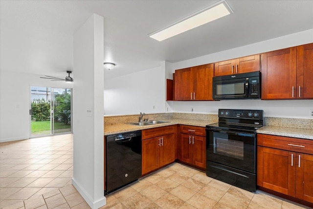 kitchen with ceiling fan, sink, light stone counters, and black appliances