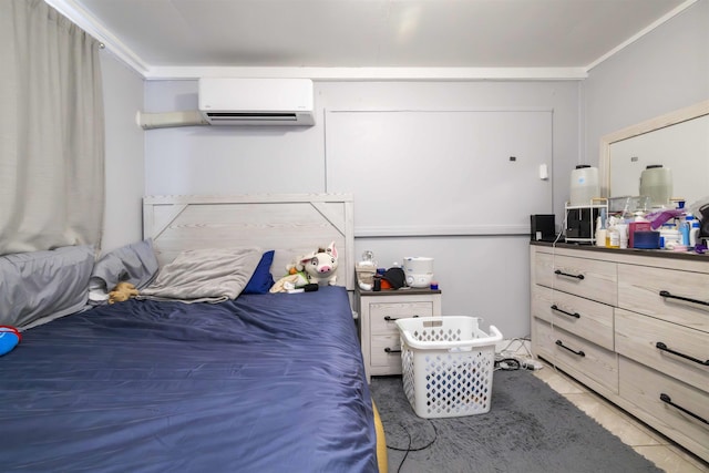 bedroom with a wall mounted air conditioner