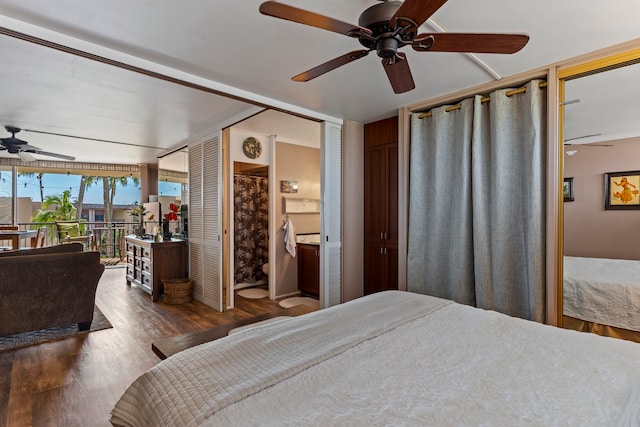 bedroom featuring ensuite bathroom, hardwood / wood-style floors, and ceiling fan