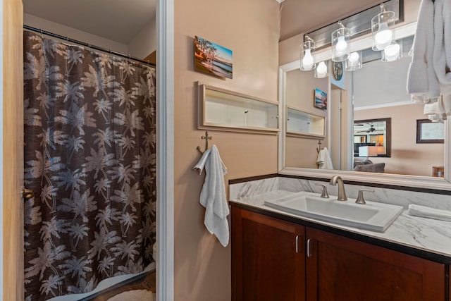 bathroom featuring vanity and crown molding