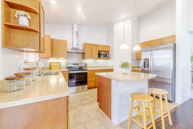 kitchen featuring appliances with stainless steel finishes, wall chimney range hood, a sink, open shelves, and a kitchen island