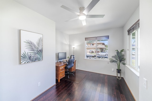 home office featuring plenty of natural light, hardwood / wood-style floors, and a ceiling fan