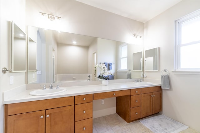 full bathroom featuring double vanity and tile patterned flooring