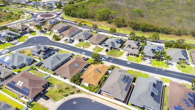 aerial view of property and surrounding area with nearby suburban area