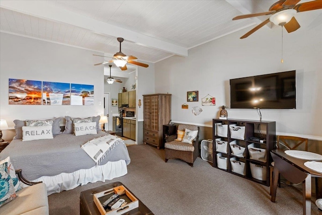 carpeted bedroom with vaulted ceiling with beams, wooden walls, and ceiling fan