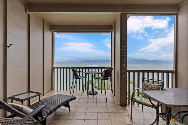 balcony featuring a water view