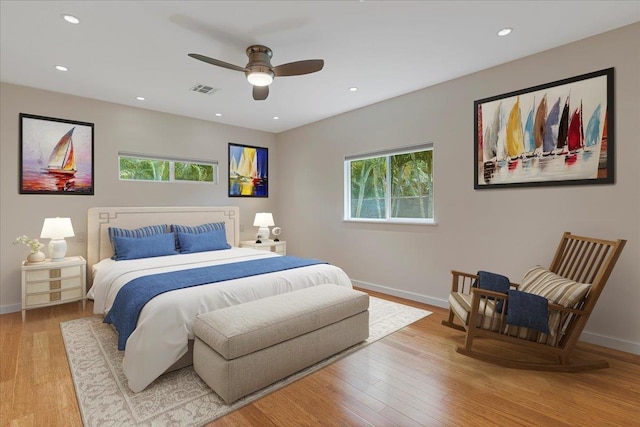 bedroom with recessed lighting, light wood-type flooring, baseboards, visible vents, and ceiling fan