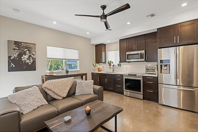 living room featuring visible vents, recessed lighting, and a ceiling fan
