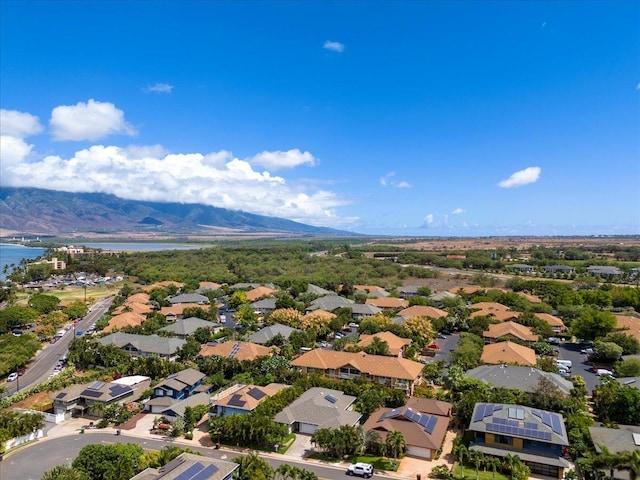 aerial view with a residential view and a water and mountain view