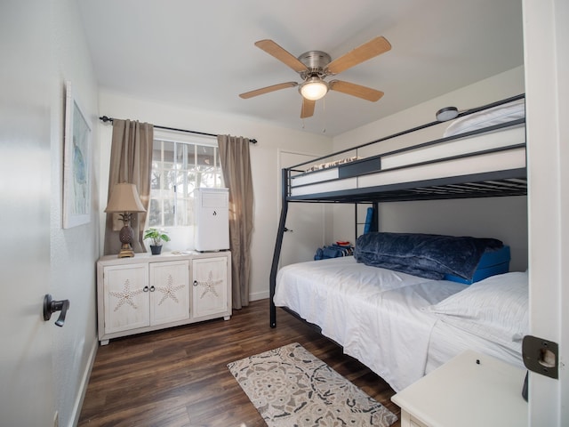 bedroom featuring dark hardwood / wood-style floors and ceiling fan