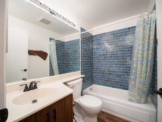 full bathroom featuring vanity, hardwood / wood-style flooring, toilet, and shower / bathtub combination with curtain