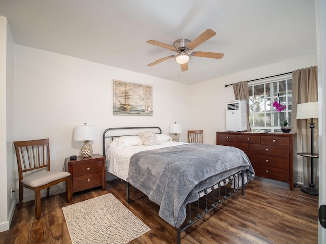 bedroom with ceiling fan and dark wood-type flooring